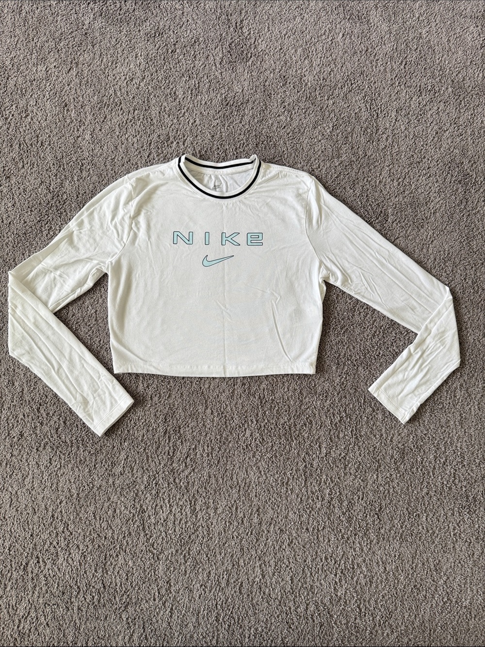 Nike White Cropped Long-Sleeve Top with Teal Logo and Black Trim